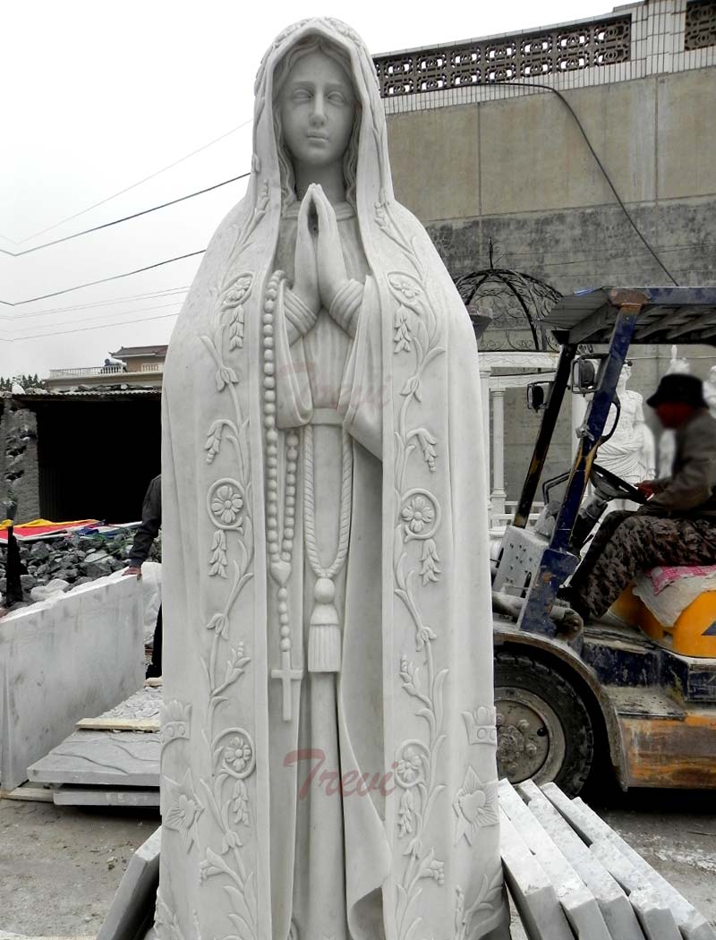 Virgen de fatima pilgrim statue with rosary beads religious church lawn ...